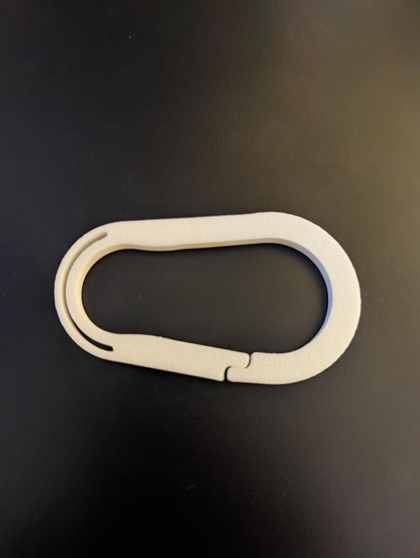 Low load compliant carabiner