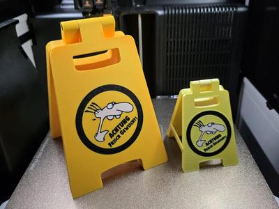 Werner Beinhart "Caution, Wet Floor!" Sign