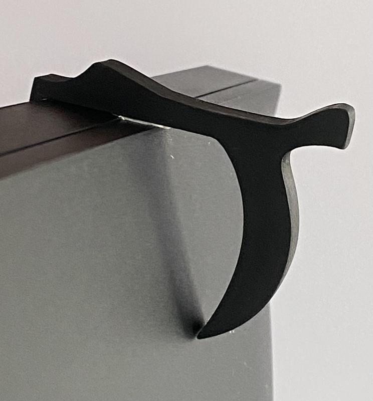 Eyeglass holder for computer monitor