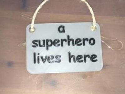 a superhero lives here