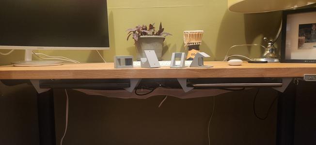 Underdesk laptop holder with hole