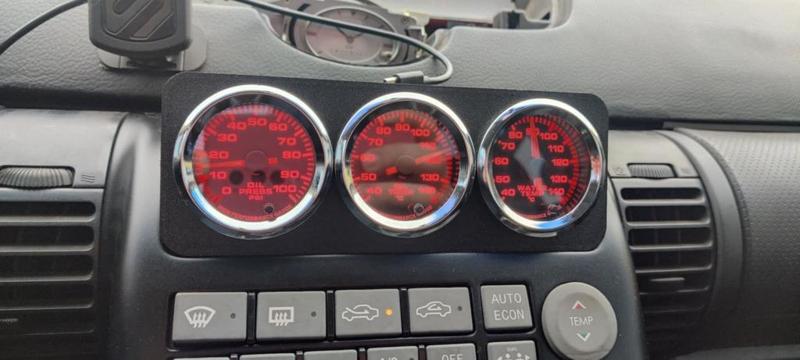 2003-2004 Infiniti G35 gauge pod holder mount thing.