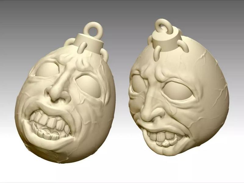 Beherit pair of zombie head pendants