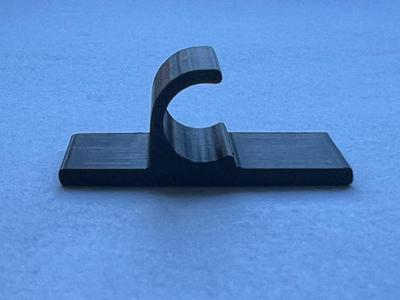 Table-mounted 9mm cable organizer