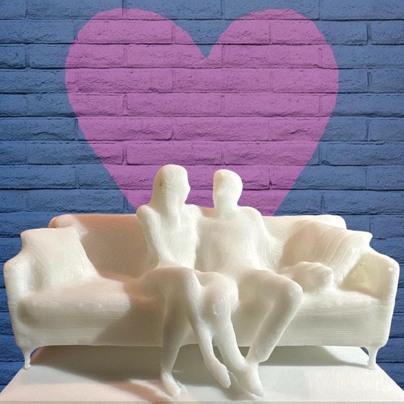 Couple sitting in a sofa