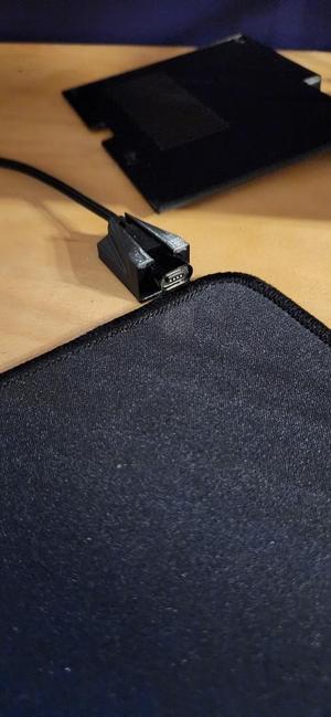 Magnetic charging cable holder