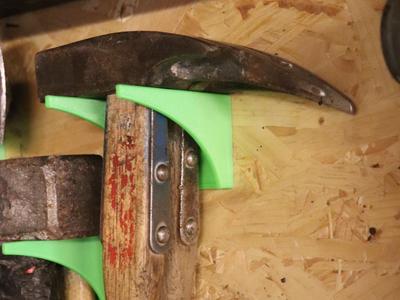 Hammer holder for multiple hammers 