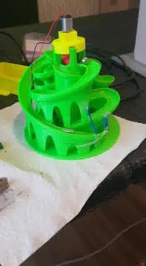 Electric motor mount for marble machine