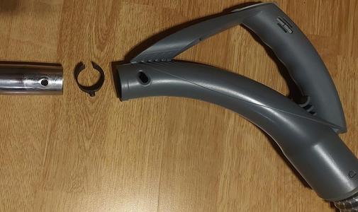 Vacuum cleaner pipe lock pin