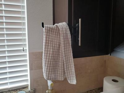 Simple cabinet handle towel holder