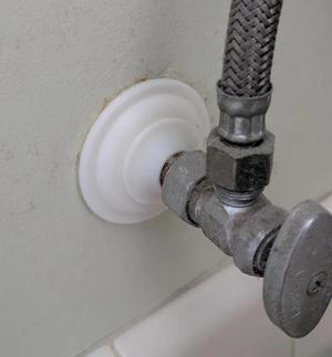 Wider stepped ogee escutcheon for 1/2 inch pipe   