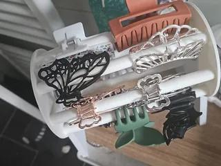 Rotatable hair clip holder