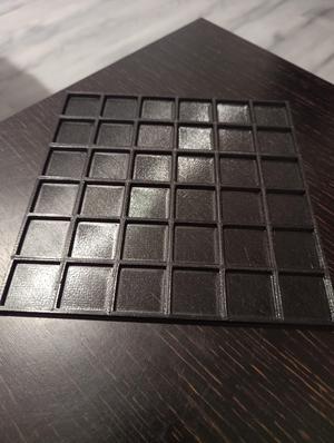 3x3 coin or change holder.