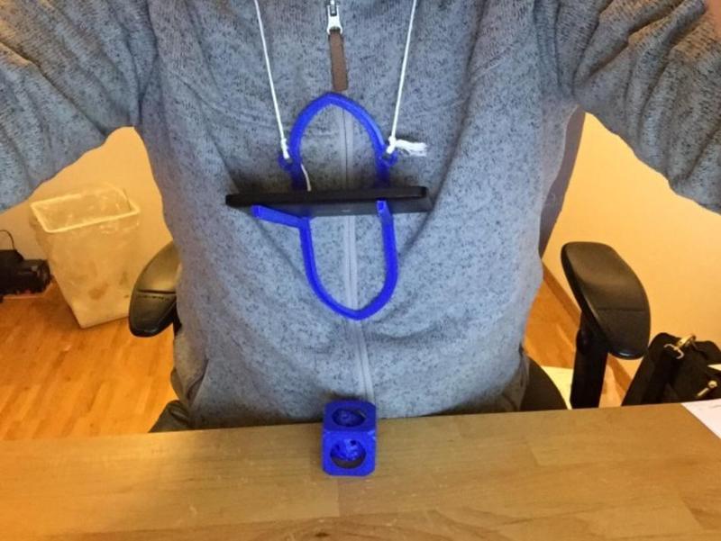 Phone holder freehand: Ego shot movie maker for presenting printed items