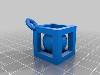 Sphere inside cube keyring 