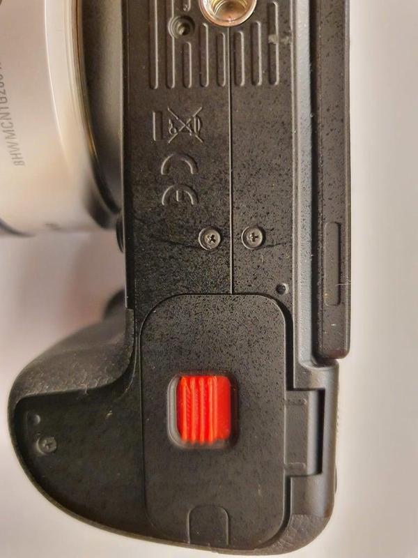 Samsung NX 30 battery door latch