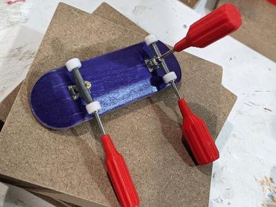 Fingerboard nut driver wrench handles