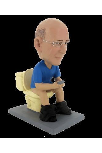 Humorous toilet figurine