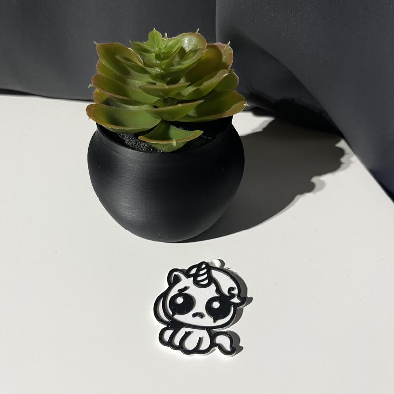 SAD UNICORN KEYCHAIN