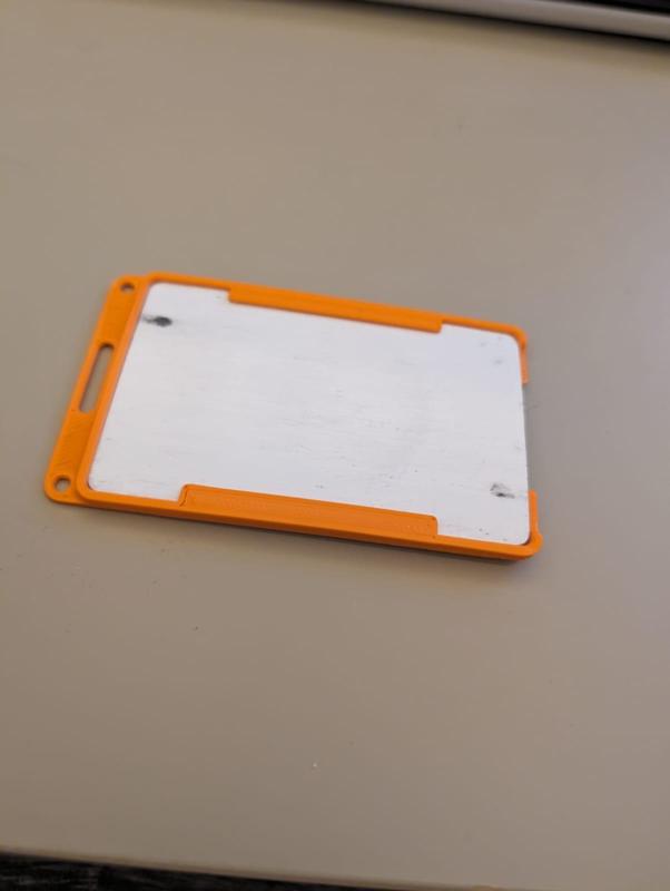 Card holder with keycord holes