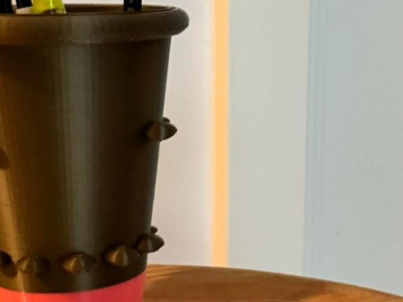 Decorative vase container designed by blind person