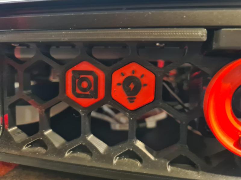 Voron Skirt Button Light symbol