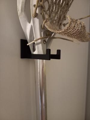 Lacrosse stick holder