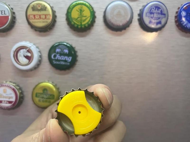 Upcycle bottle caps into colorful refrigerator magnets