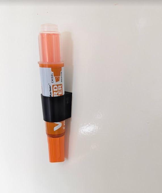 Whiteboard marker magnet holder