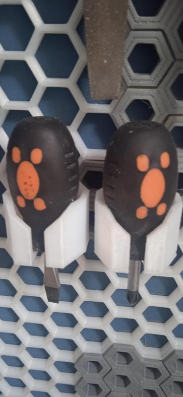 Tool holder for honeycomb shelf