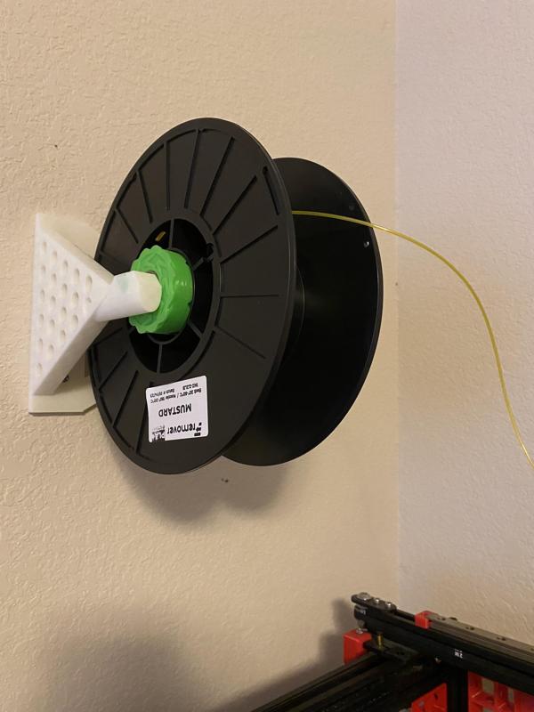 wall mounted auto rewind spool holder