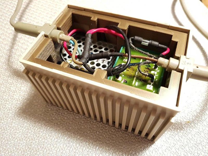 Commodore C64 power adapter repair rebrick installation frame jig