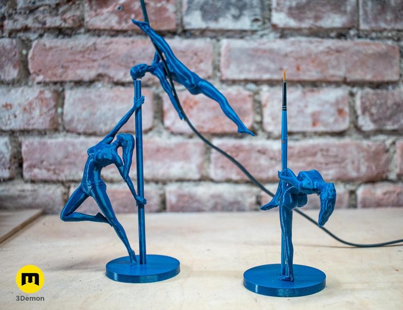 Statues of Pole Dancers (pen holders)
