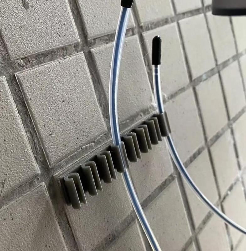 Filament/Teflon tube wall clip