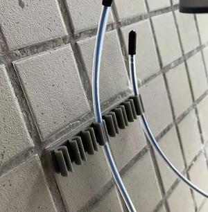 Filament/Teflon tube wall clip