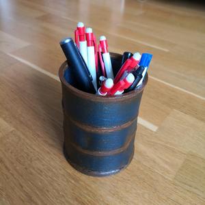 Dented barrel pen holder