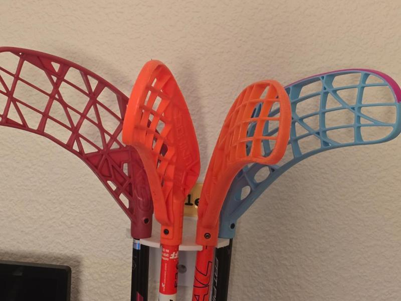 Floorball stick hanger