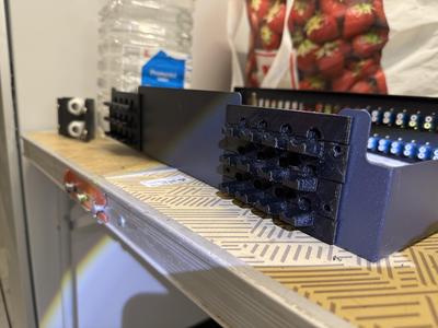 Clamp for up to twelve fiber optic cables