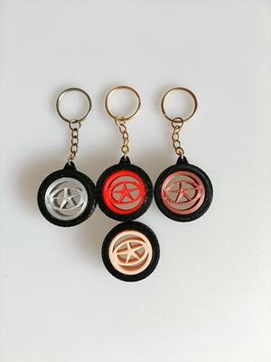 JAC Gyroscope Tire Keychain – Rotating Logo