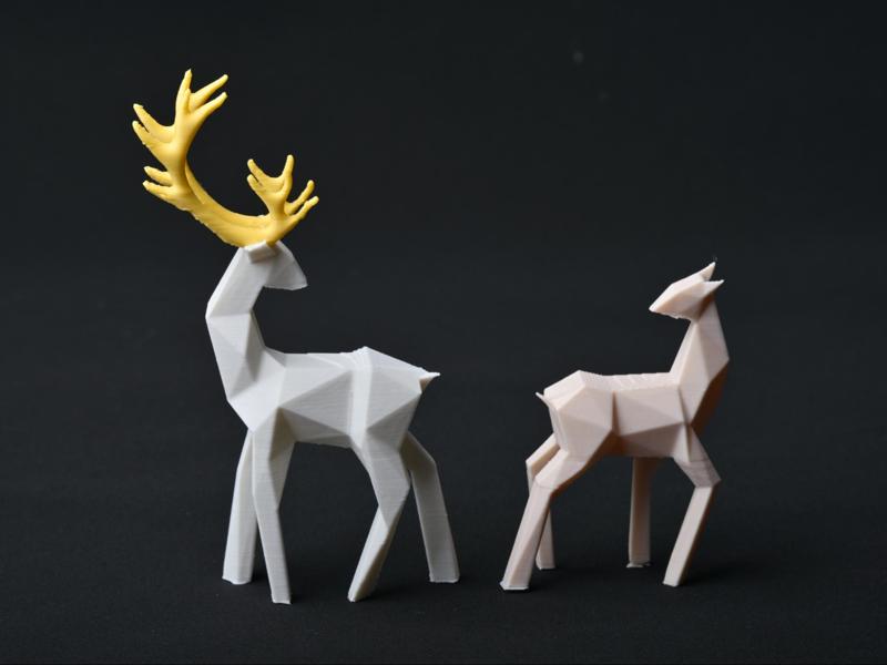 A Pair of Sliced Fawn Figurines