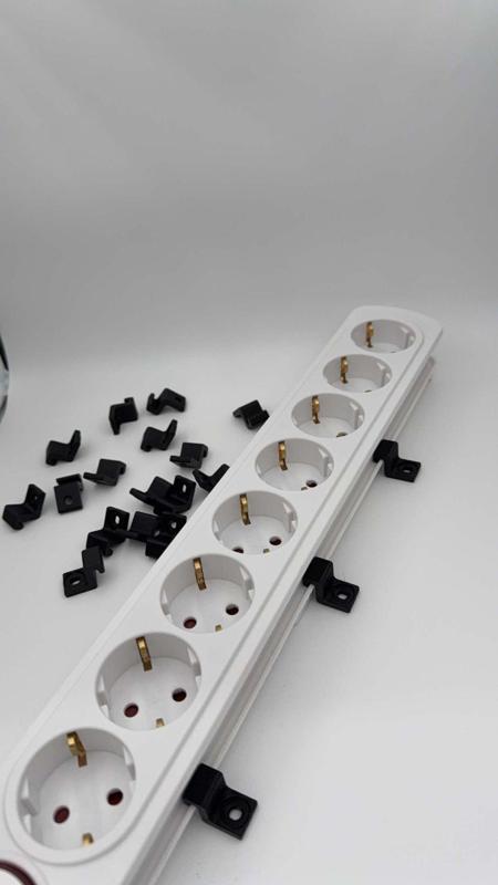 Mount for multi outlet extension cords from Clas Ohlson