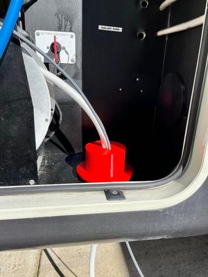 6 Inch Magnetic RV Utility Hatch with smaller hose and Starlink