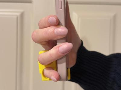 Handheld or desktop mobile phone stand