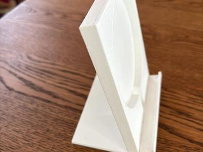 Phone stand/holder with wireless charger place