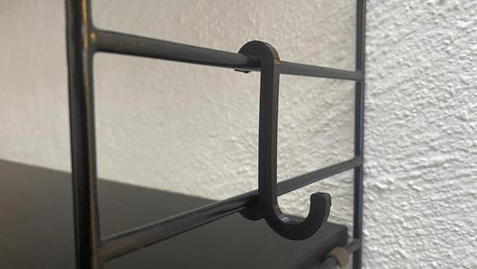 Snap in hook for String shelves