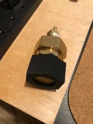 hose cap with a concentric 20mm diameter hole.   