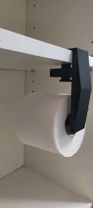 Under desk toilet paper holder   