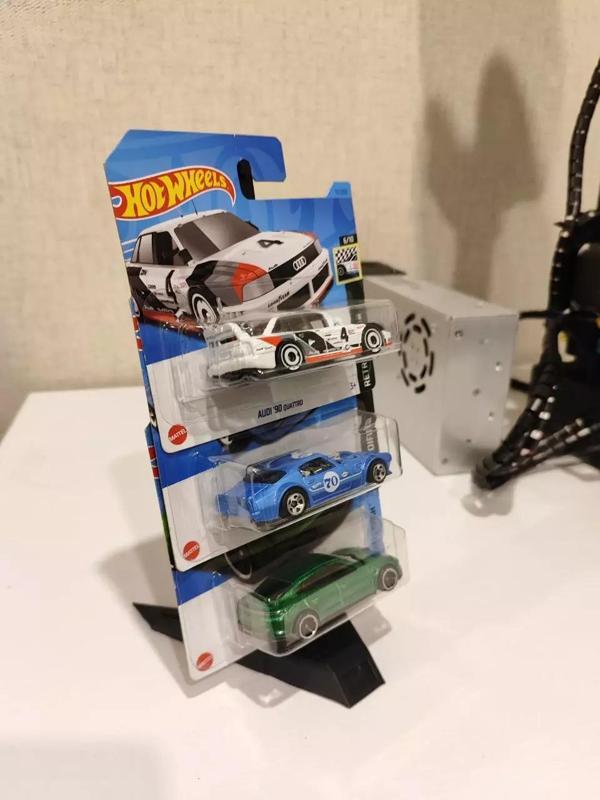 Display stand for packaged Hot Wheels cars