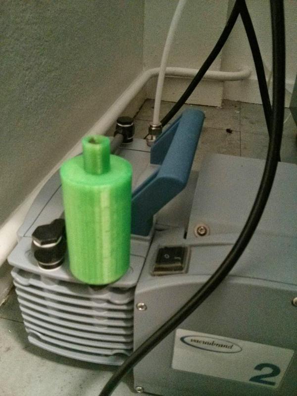 muffler for a vacuum pump