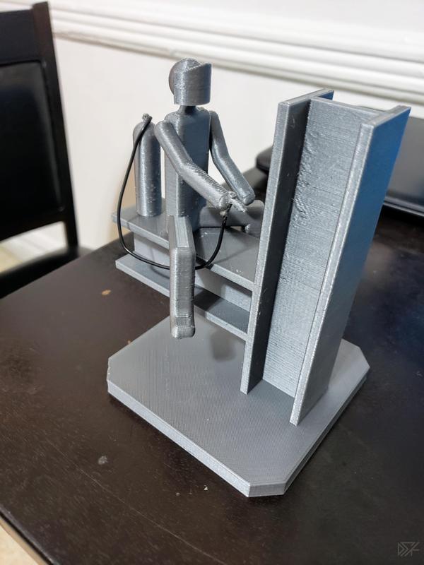 Welder sitting on steel construction